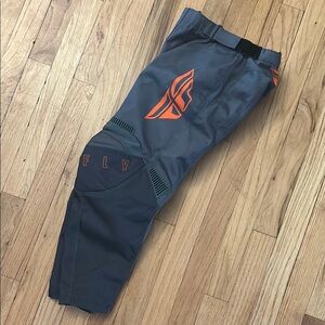 Gray and Orange Fly Racing Kinetic Mx bmx pants
